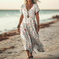 Rochie de damă elegantă, largă, cu decolteu în formă de inimă și imprimeu