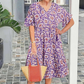 Rochie midi imprimată cu decolteu în V